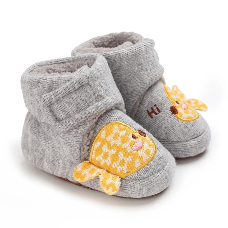 Gray baby shoes with yellow patterned fish accents and wide ankle closures.