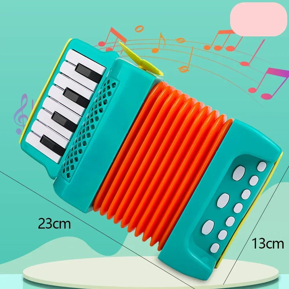 Green toy accordion with orange bellows and 23 by 13 cm measurements