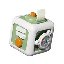 Green and white activity cube with orange controls and a clear bead spinner