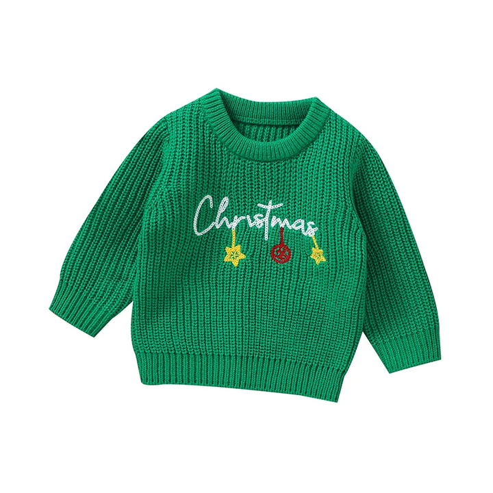 Green Christmas sweater with white lettering, yellow stars, and a red ornament.