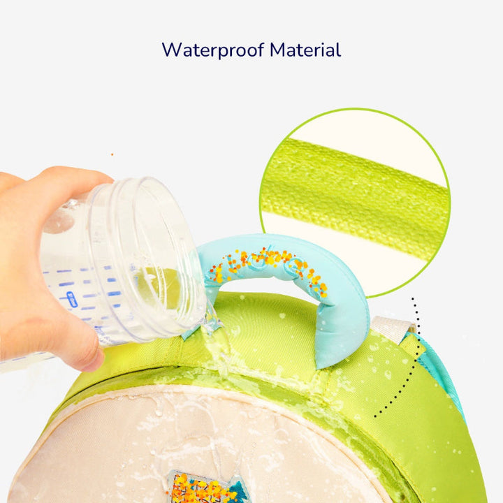 Water poured over a green backpack to demonstrate its water-repellent outer fabric