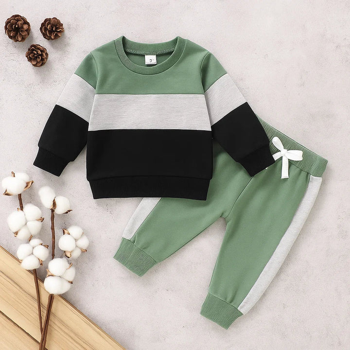 Green, gray and black sweatshirt with green joggers and white side stripes