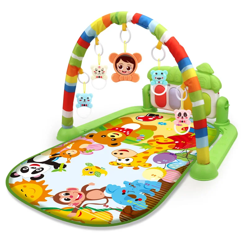 Green baby gym with a bright animal-print mat and multicolored toy arch