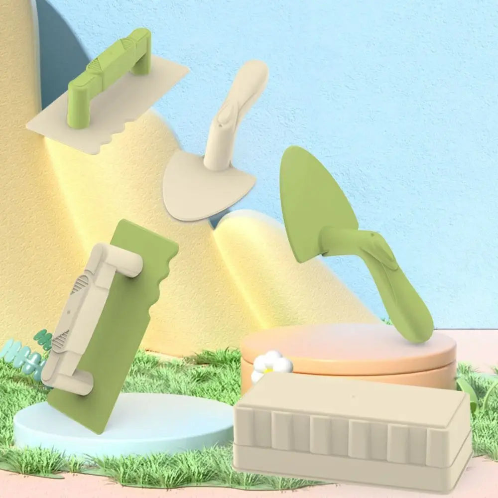 Green and cream sand mold, trowels, and handled spatulas arranged on a colorful display