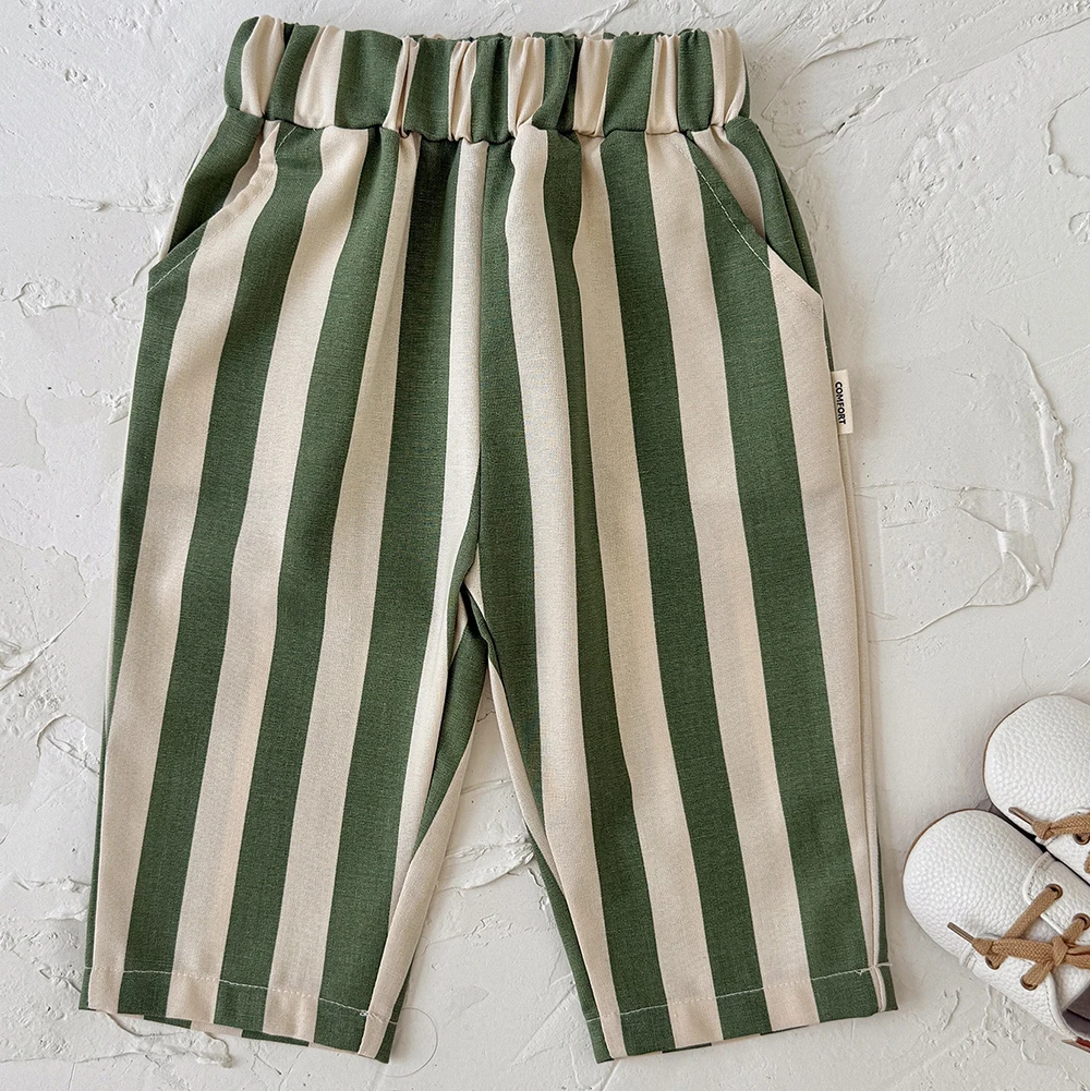 Green and cream striped baby pants with an elastic waist and side pockets