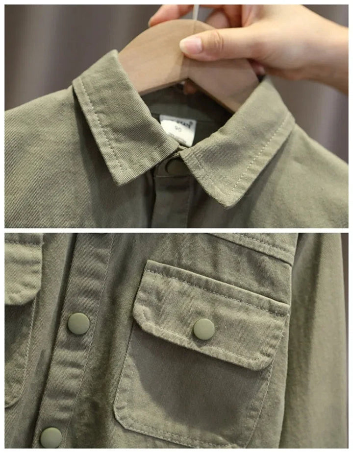 Green denim shirt collar, front buttons, and flap chest pocket shown in close-up