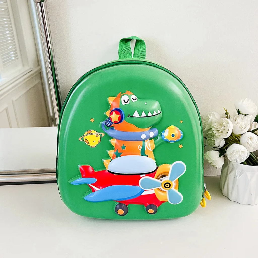 Green dinosaur backpack with a cartoon dinosaur and red airplane