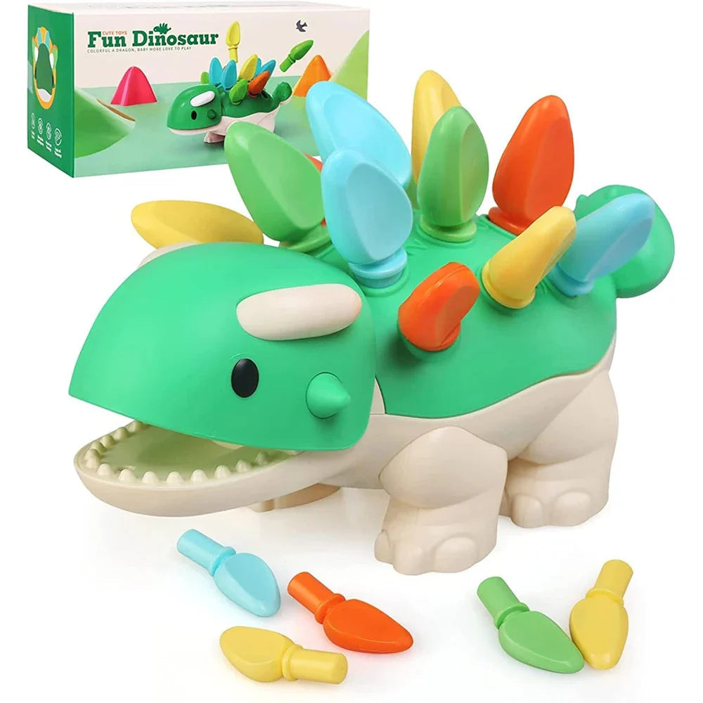 Green dinosaur learning toy with colorful removable spikes and a product box
