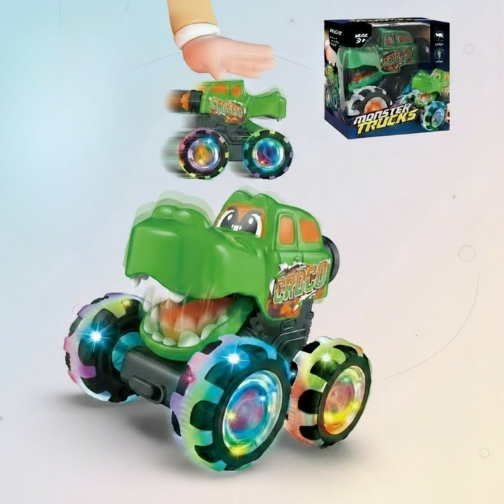 Green dinosaur monster truck with illuminated wheels and an inset showing a hand pressing the top
