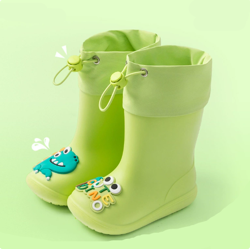 Green dinosaur rain boots with adjustable drawstring tops