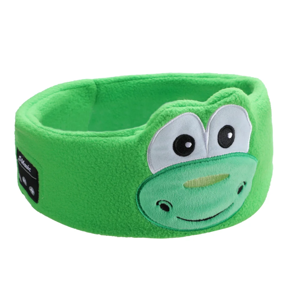 Green dinosaur-design Bluetooth sleep mask with large eyes and an embroidered snout.