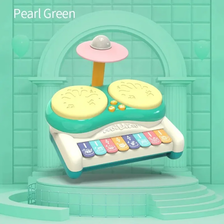 Green drum and keyboard toy with two yellow drum pads and a raised pink cymbal