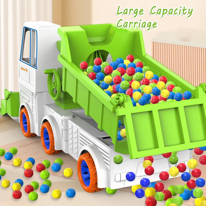 Green toy dump truck with a raised bed filled with colorful balls