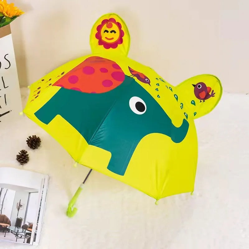 Yellow umbrella with a green elephant, colorful accents, and a green curved handle