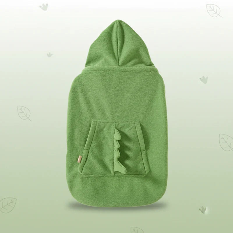 Green fleece dinosaur cover with a pointed hood, front pocket and raised fabric spikes