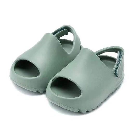 Green EVA foam sandals with open toes and adjustable heel straps.