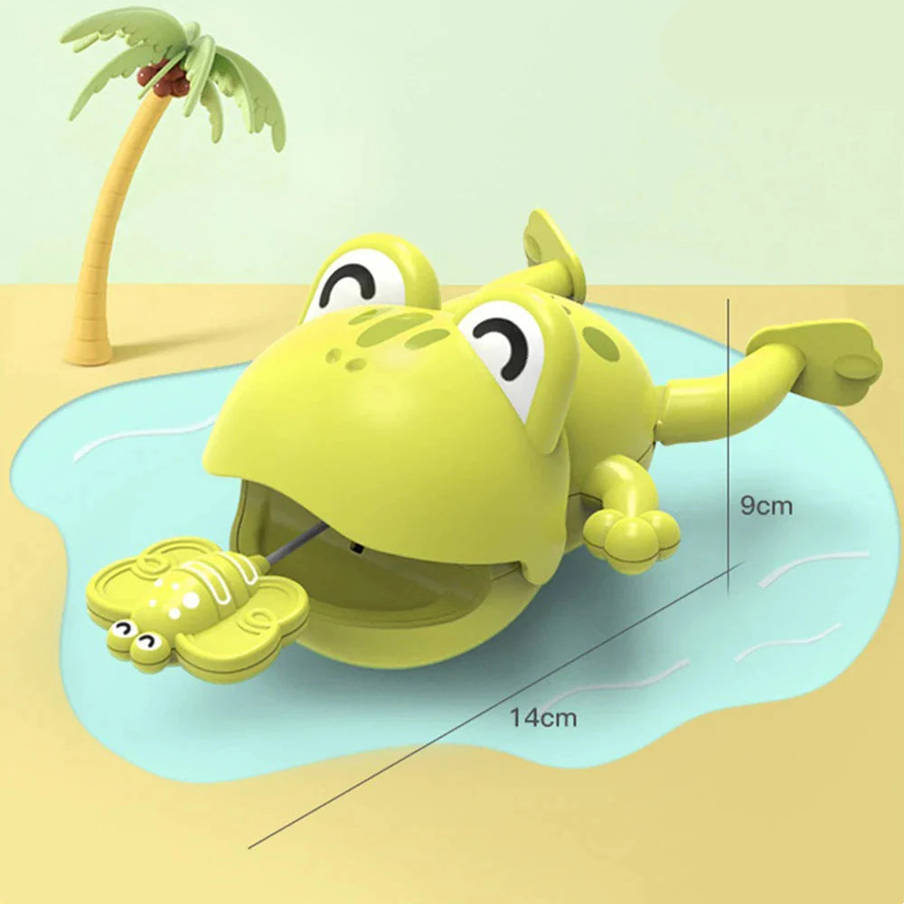 Green frog bath toy with an animal-shaped pull handle and 9 cm by 14 cm measurements
