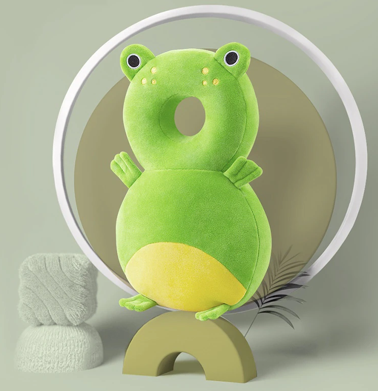 Green frog head-and-back cushion with a yellow belly and a round head opening