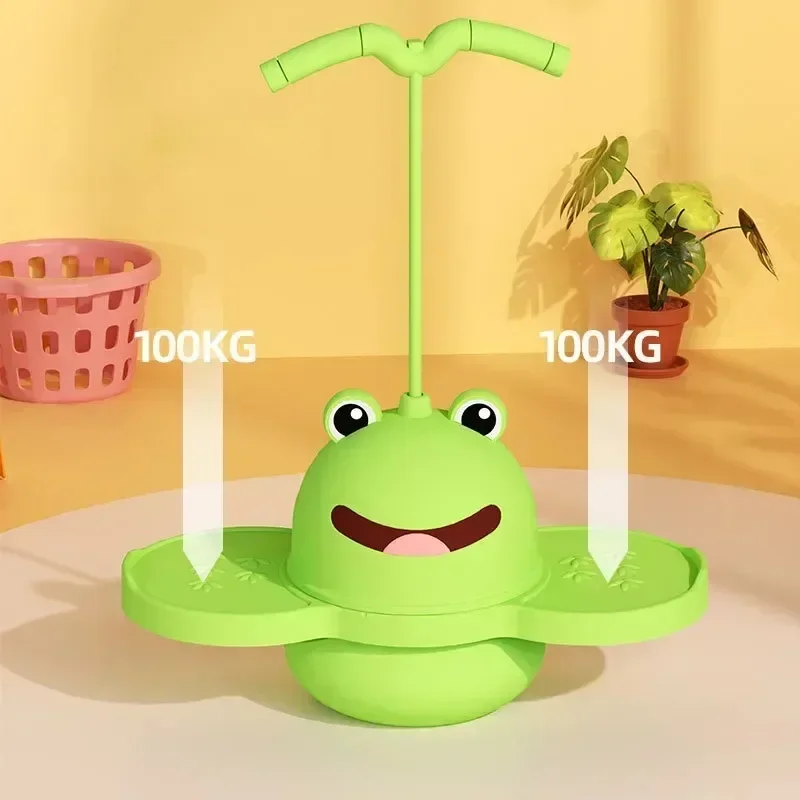 Green frog pogo stick with arrows highlighting both foot platforms.