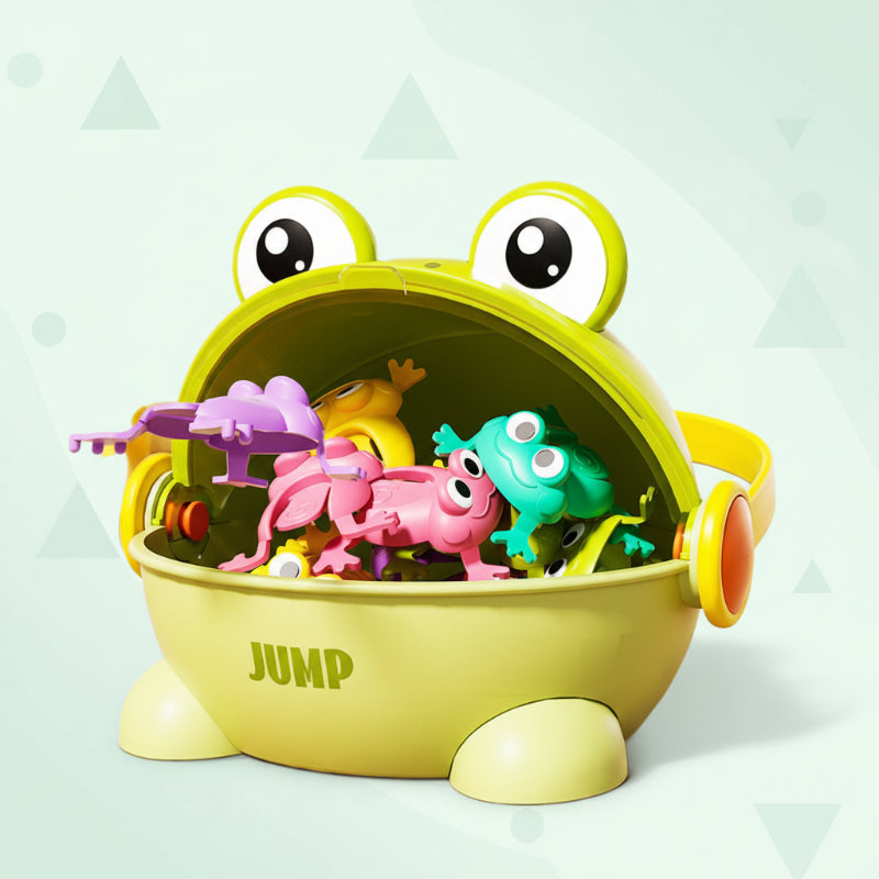 Green frog-shaped game case with an open mouth filled with colorful jumping frogs.