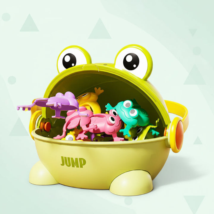 Green frog-shaped game case with an open mouth filled with colorful jumping frogs.