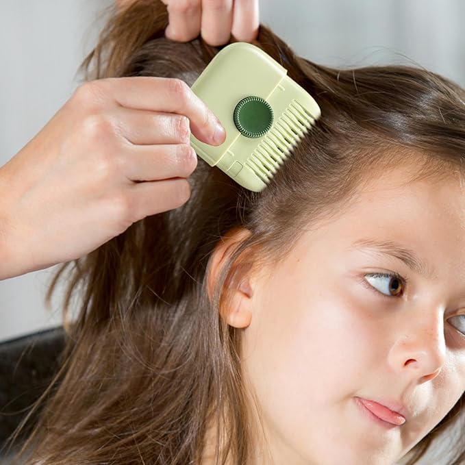 Green comb-style hair trimmer being used along the side of a child&
