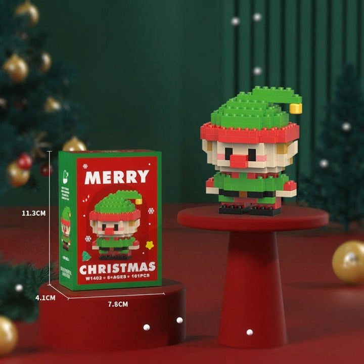 Mini elf block figure in a green hat beside its box