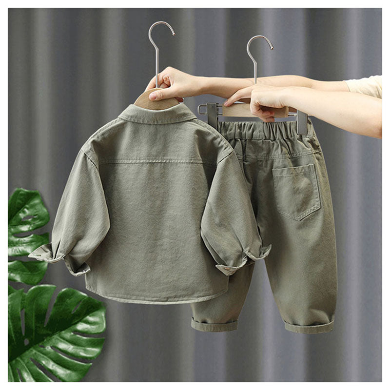 Back view of the green jacket and matching pants on wooden hangers