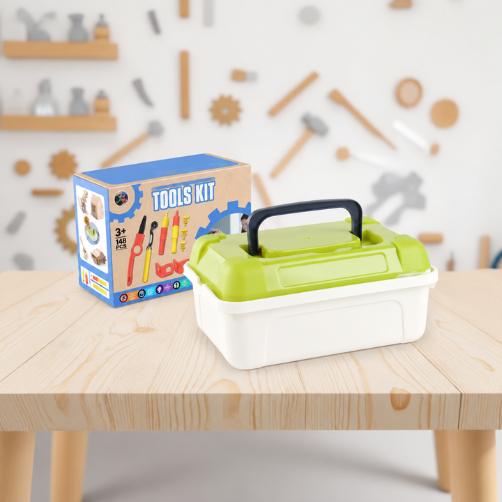 Green-lidded storage box beside the cardboard tool kit packaging