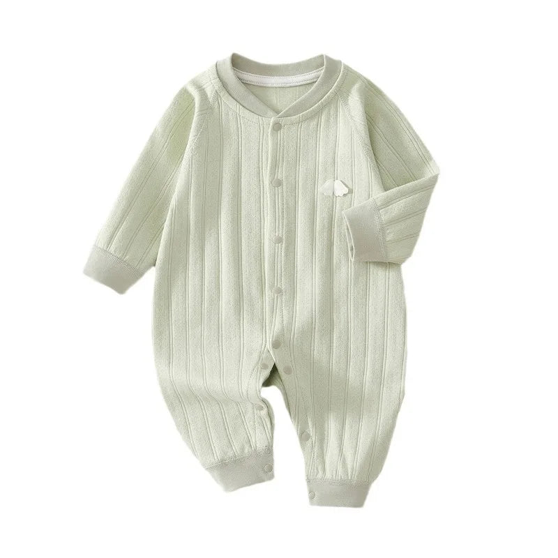 Front view of the green long-sleeve baby romper with snap closures