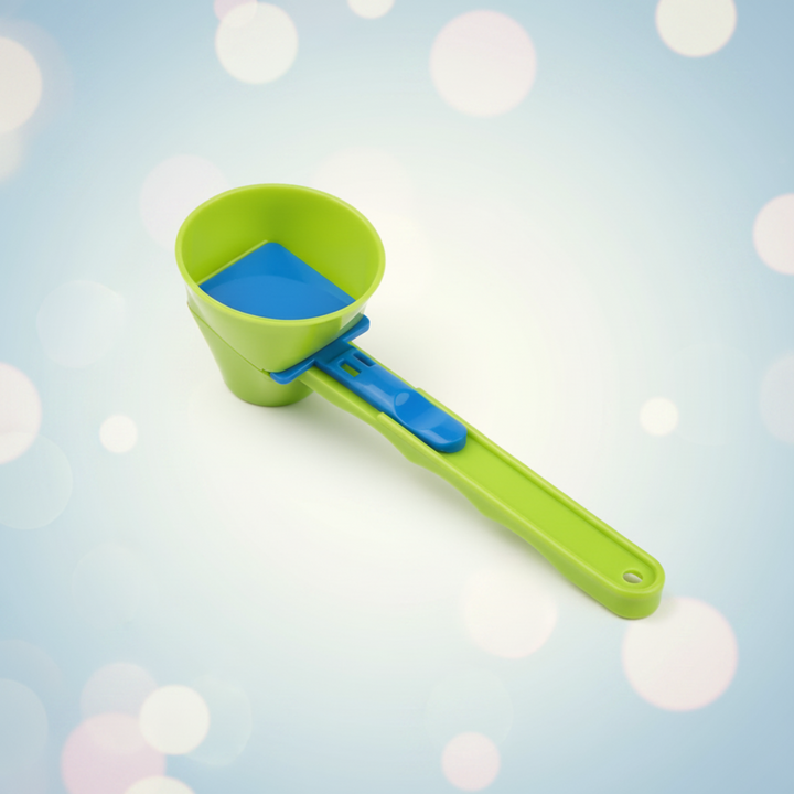 Green measuring scoop with a blue sliding base and long handle