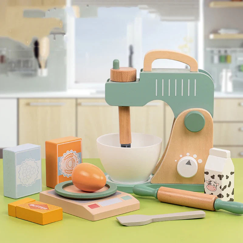 Green wooden mixer with bowl, play scale, rolling pin, pretend milk carton, and baking accessories