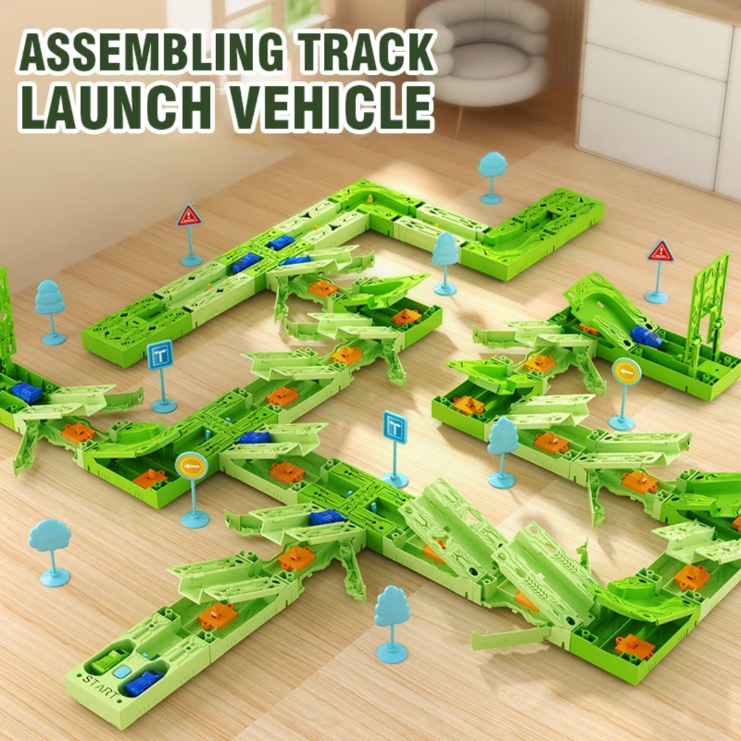 Green modular car track with curves, junctions, cars, signs, and trees on a wooden table