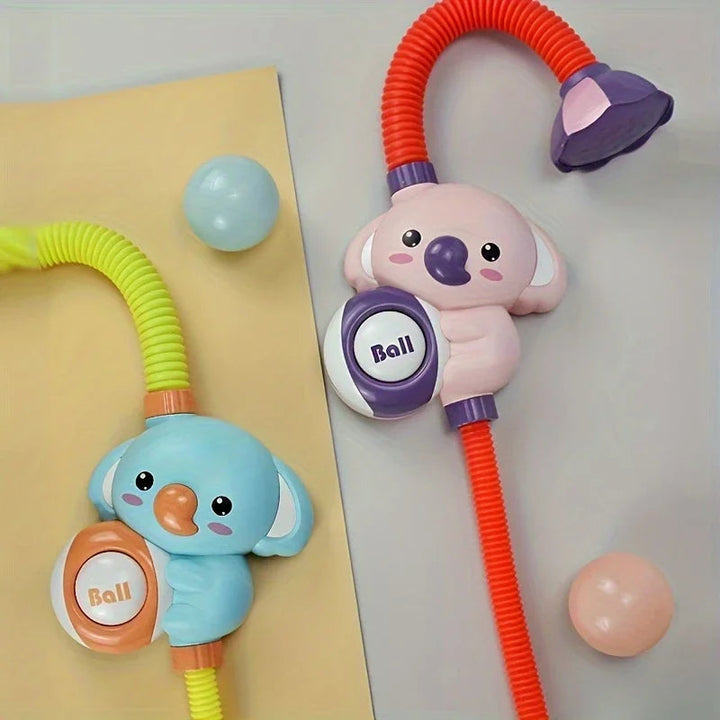 Green and Pink bath shower toys displayed side by side with their flexible necks bent