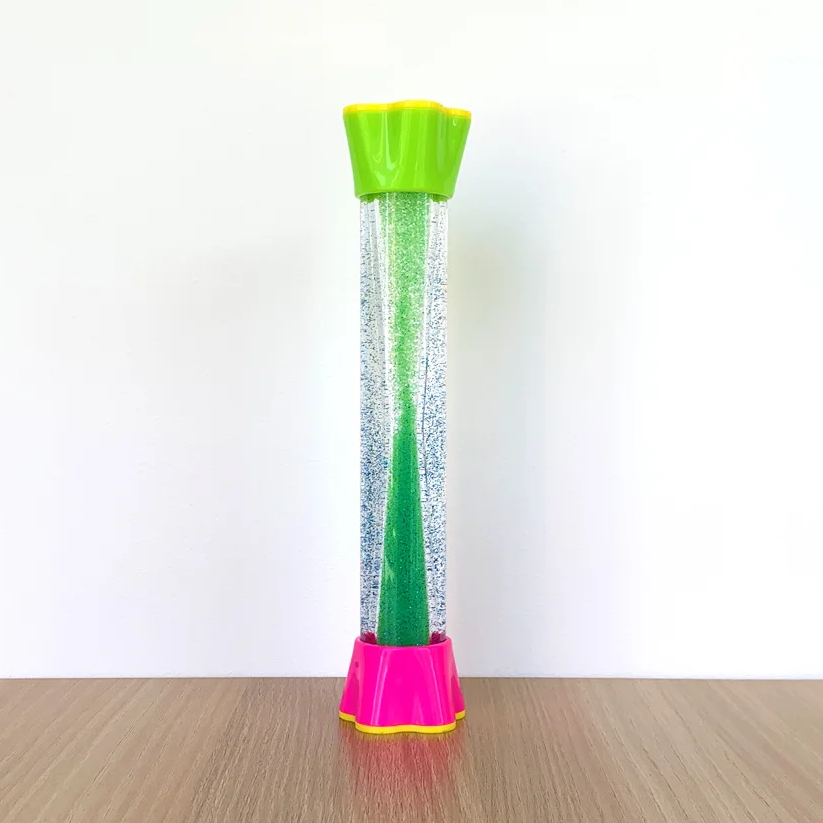 Green glitter sensory tube with a green top and pink base