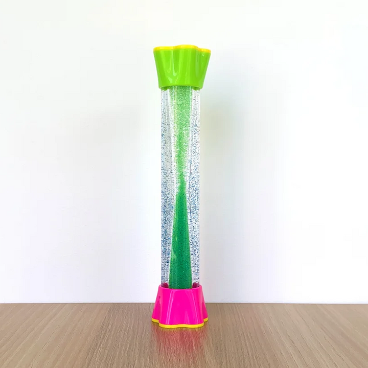 Green glitter sensory tube with a green top and pink base