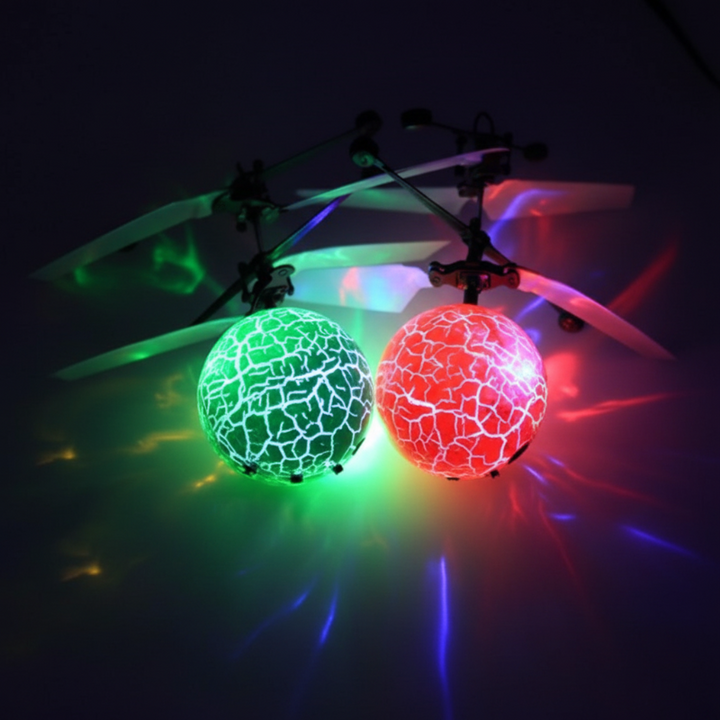 Green and red LED flying balls glowing beneath stacked rotor blades