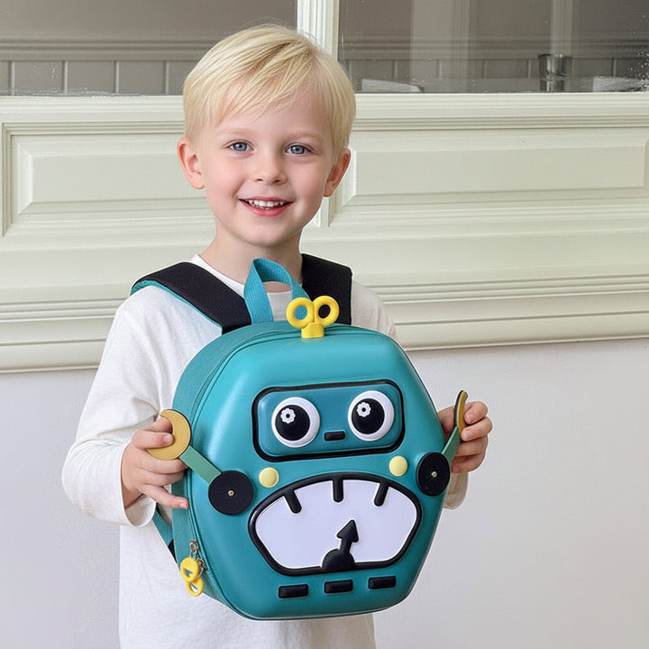 Child wearing a green 3D robot backpack with yellow accents