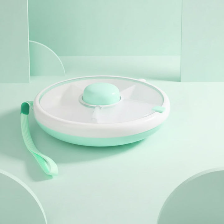 Green round snack box with a clear lid, center button, and matching wrist strap