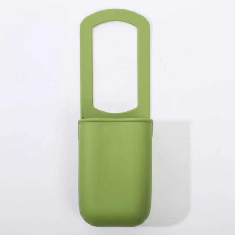 Green silicone cup holder with an open cup section and hanging loop.