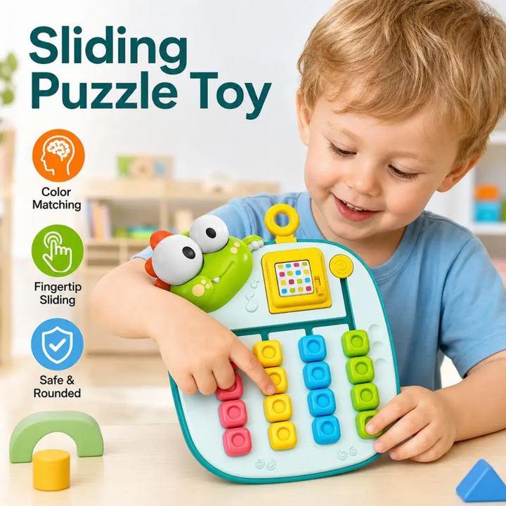 Child in a blue shirt playing with the green color-matching sliding puzzle