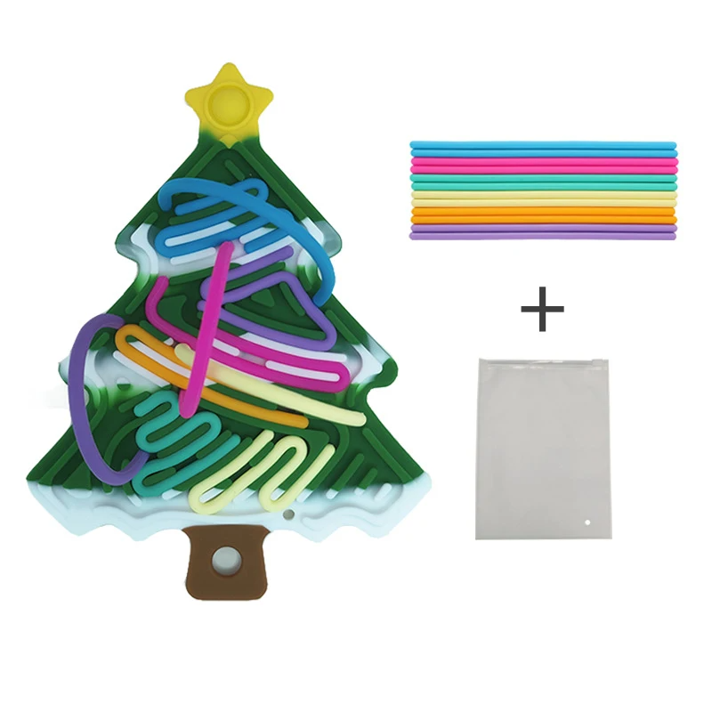 Green snow-accented Christmas tree fidget with colorful cords and a storage bag