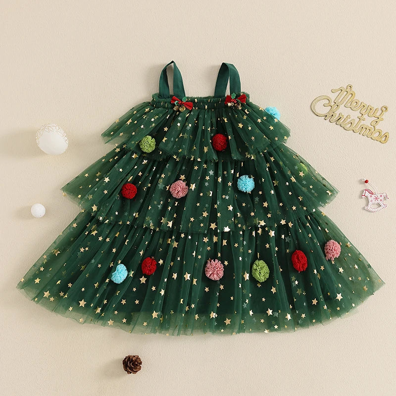 Green tiered Christmas dress with gold stars, shoulder straps, and colorful pom-pom accents