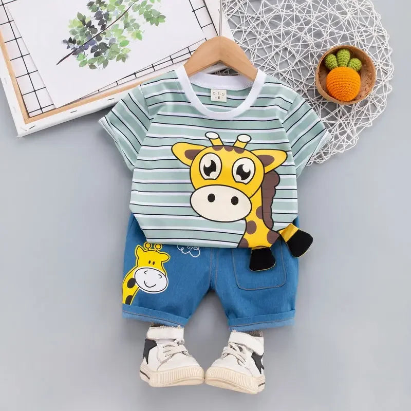 Green striped giraffe T-shirt and blue shorts with a matching giraffe detail