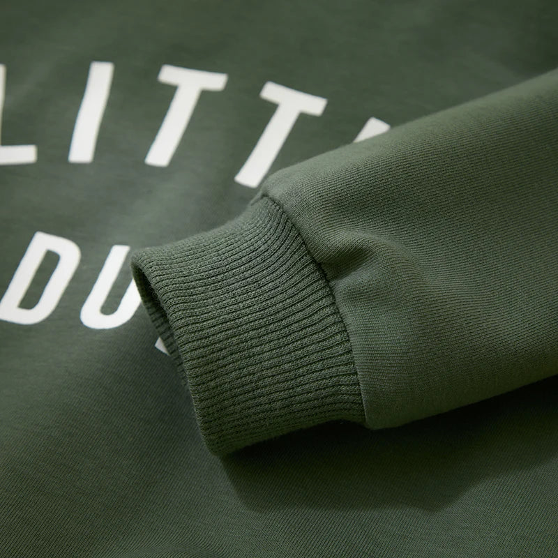 Ribbed sleeve cuff on the green letter-print sweatshirt