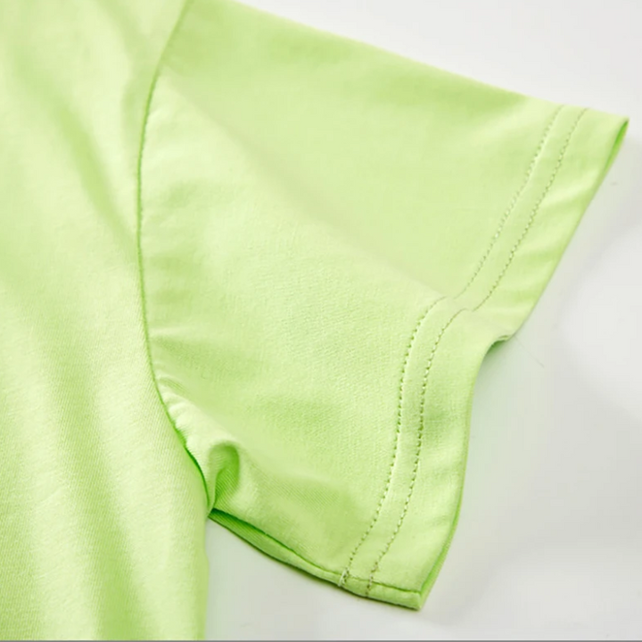 Green T-shirt sleeve showing double rows of hem stitching