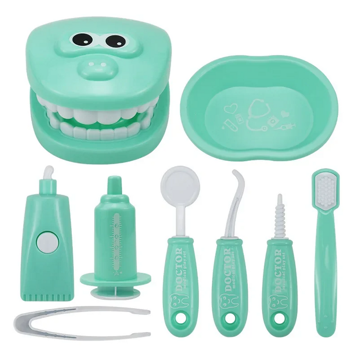 Green dentist playset with a tooth model, matching tray, toothbrush, and pretend dental tools