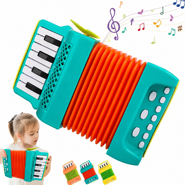 Green toy accordion with orange bellows, piano-style keys, and white bass buttons