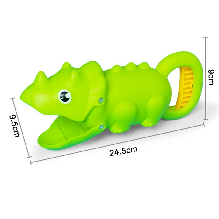 Green triceratops-shaped sand grabber measuring 24.5 x 9 x 9.5 cm