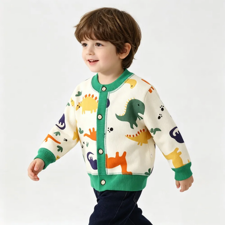 Cream dinosaur-pattern cardigan with green cuffs and hem, shown from the side